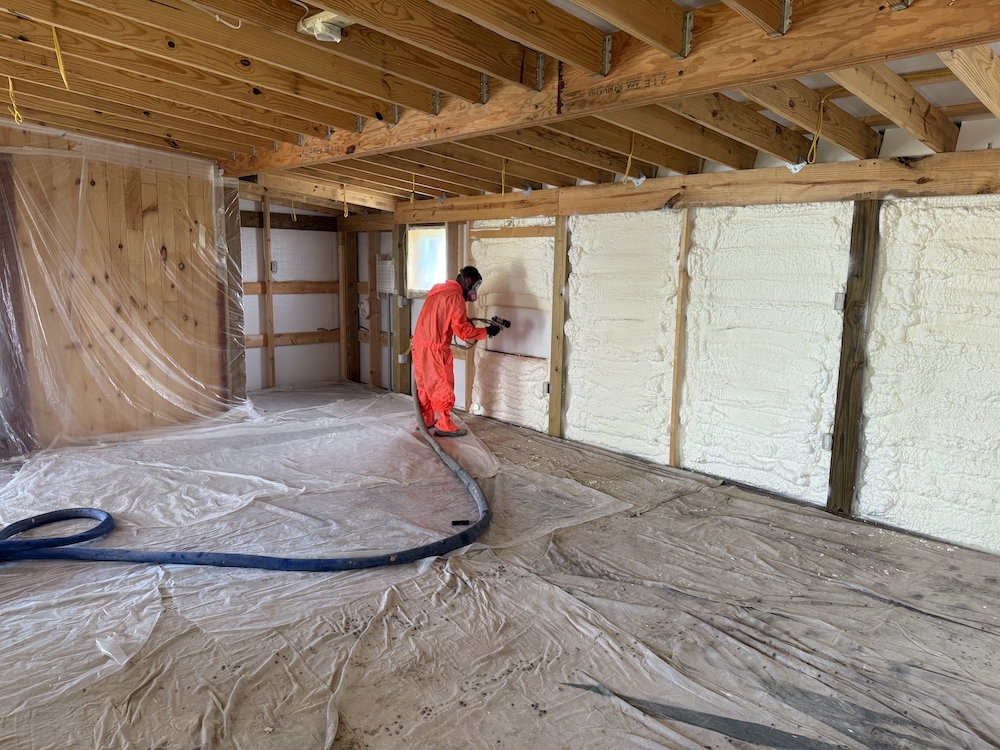 Spray foam insulation application process inside residential building in Frankfort Kentucky