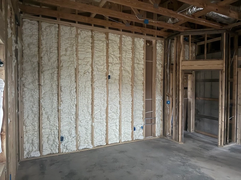 Spray foam insulation sealing walls and improving energy efficiency in Central Kentucky home